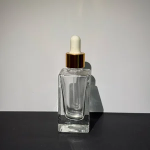 بطری شیشه‌ای ۳۰ میل شفاف با قطره چکان مناسب برای اسانس، روغن و سرم پوست