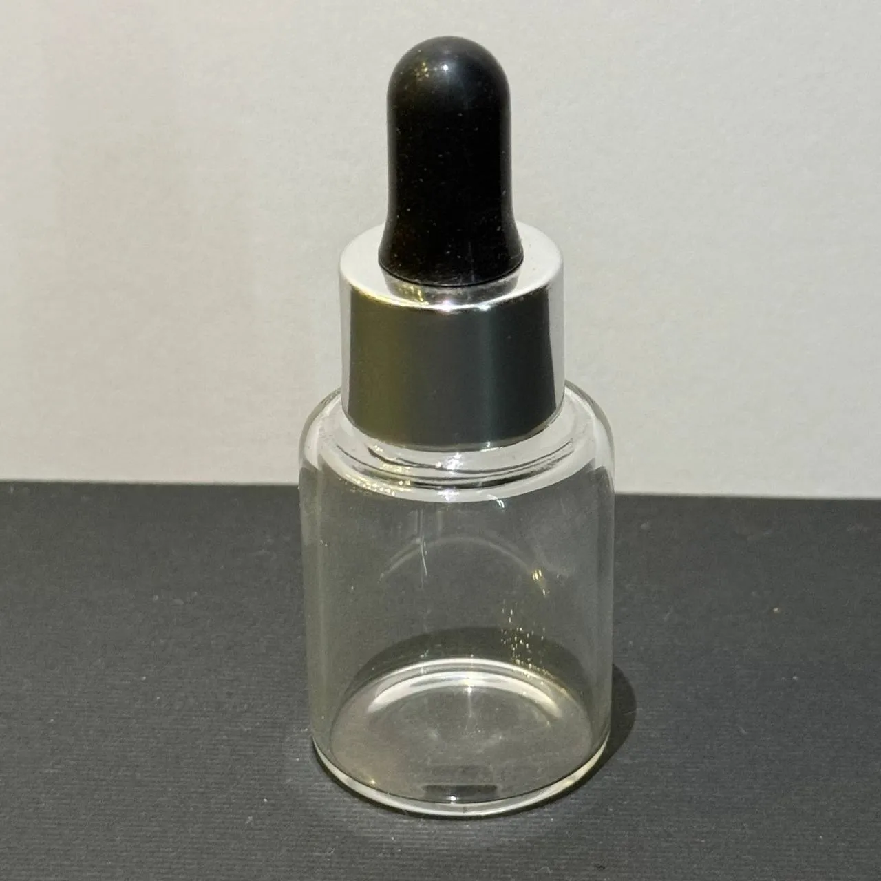 photo_۲۰۲۵-۰۵-۱۸_۱۰-۵۷-۰۶ ويال ١٠ ميل شفاف با قطره چكان مشکی کروم - Image 1
